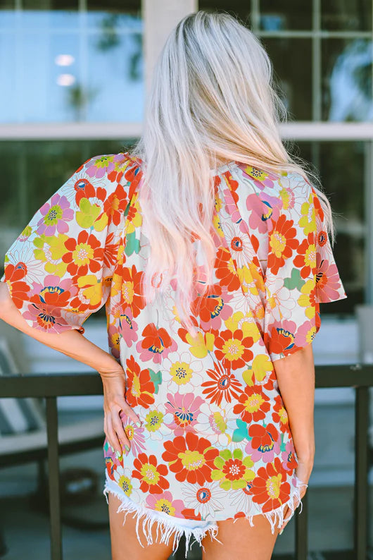 Orange Abstract V Neck Half Sleeve Blouse